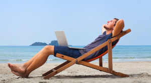Armchair travel destinations man relaxing on beach